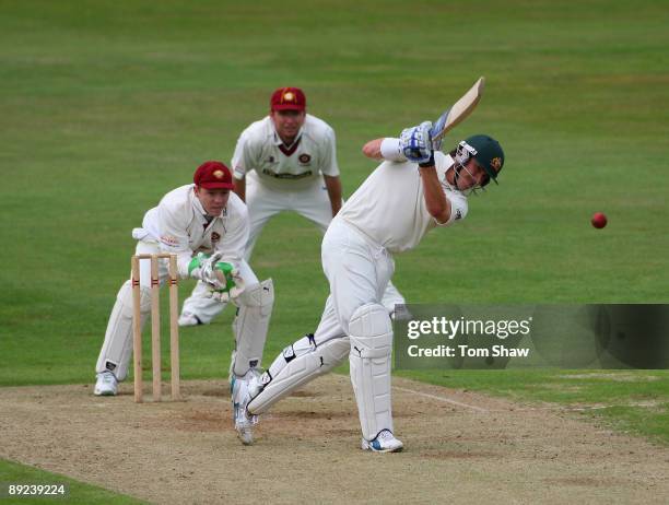 Marcus North of Australia hits out during the tour match between Northamptonshire and Australia at the County Ground on July 24, 2009 in Northampton,...