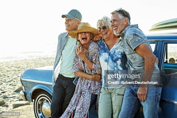 a group of friends on a road trip to the beach - la four stock pictures, royalty-free photos & images