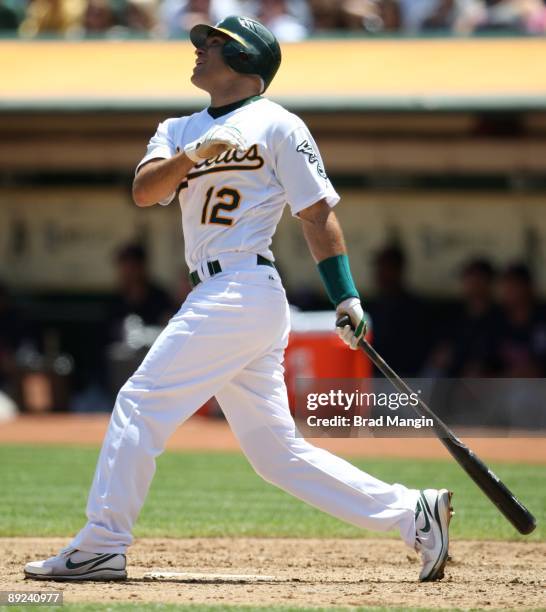 Scott Hairston of the Oakland Athletics bats against the Minnesota Twins during the game at the Oakland-Alameda County Coliseum on July 22, 2009 in...