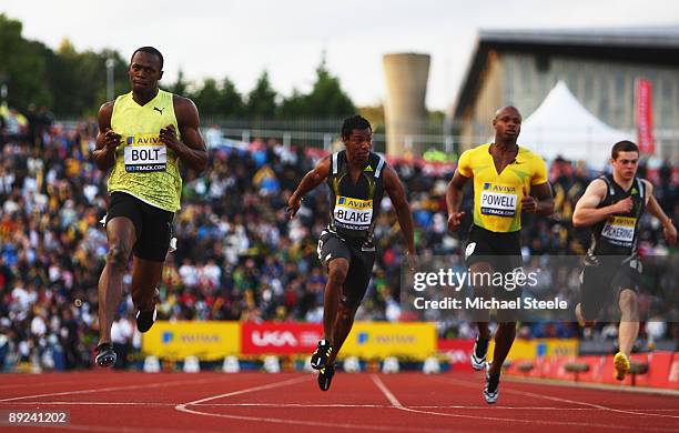 Usain Bolt of Jamaica wins the Men's 100 Metres Final ahead of Daniel Bailey of Antigua, Asafa Powell of Jamaica and Craig Pickering of Great Britain...