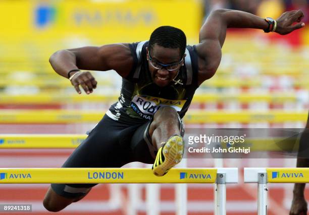 Dayron Robles of Cuba competes in the Men's 110m Hurdles Final during day one of the Aviva London Grand Prix track and field meeting at Crystal...