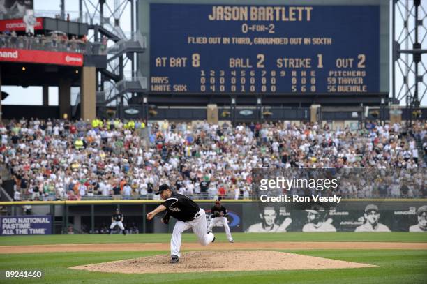 Mark Buehrle of the Chicago White Sox throws the final pitch of the game to Jason Bartlett to record the 18th perfect game in major league history...