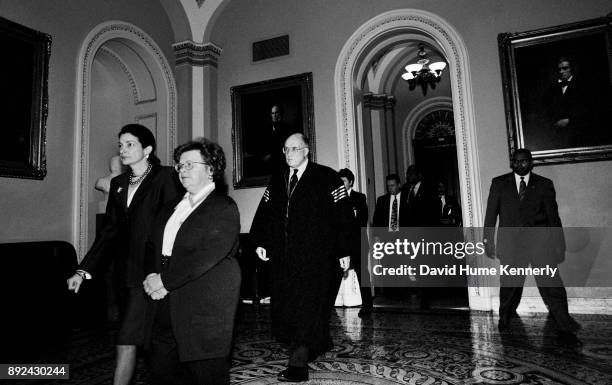 Supreme Court Chief Justice Rehnquist walks through the East Room of the Capital Building on his way to preside of the beginning of the Clinton...