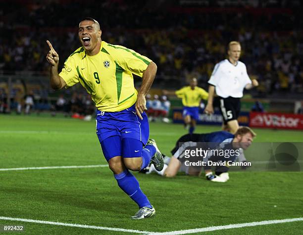 Ronaldo of Brazil celebrates after scoring opening goal during the Germany v Brazil, World Cup Final match played at the International Stadium...