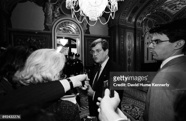 Senate Majority Leader Trent Lott speaks with reporters in the halls the U.S. Capitol Building on the first day of the Senate Impeachment Trial of...