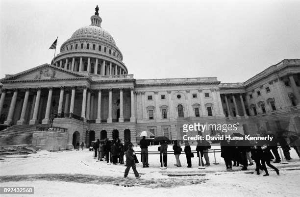Potential spectators waiting outside the U.S. Capitol Building during the third day of the Impeachment Trial of President Bill Clinton on Jan. 9,...