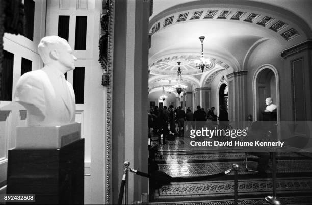The bust of Richard Nixon, as vice president, overlooks the hallways of the U.S. Capitol Building during the Senate Impeachment Trial of President...