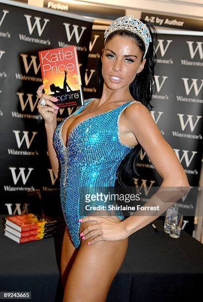 Katie Price poses at photocall to launch her new novel 'Sapphire' at Waterstones Arndale Centre on July 24, 2009 in Manchester, England.