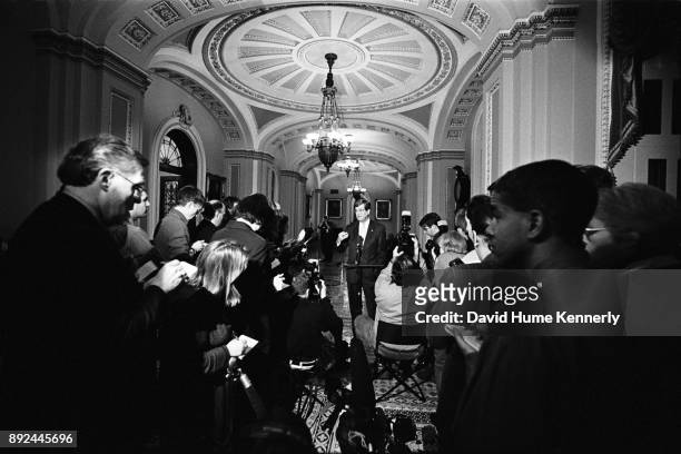Senate Majority Leader Trent Lott, of Mississippi, talks with reporters during a break from the Senate Impeachment Trial on charges he broke the law...