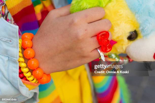 Kanpei , with brightly colored extensions, wearing a rainbow striped shirt by W Heart C, rainbow scarf, light blue denim jacket, yellow ankle length...