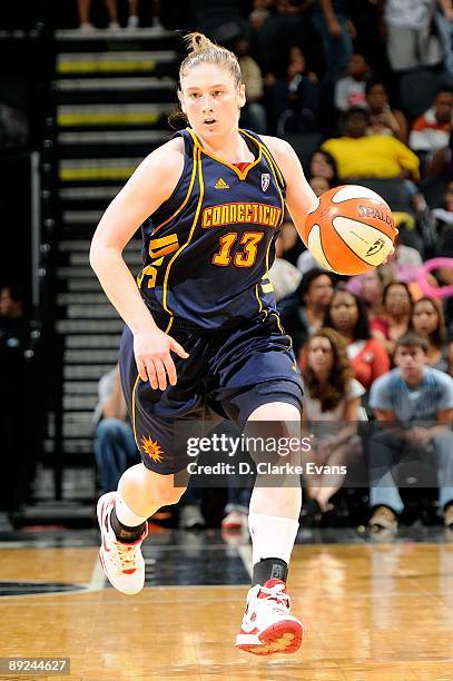 Lindsay Whalen of the Connecticut Sun drives the ball up court during the WNBA game against the San Antonio Silver Stars on July 17, 2009 at the AT&T...