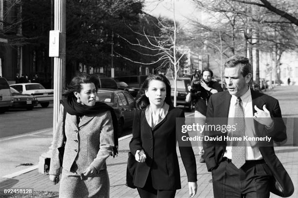 Lawyers for President Bill Clinton, including Cheryl Mills, Nicole Seligman, and Bruce Lindsey, walk through Lafayette Square on their way to the...