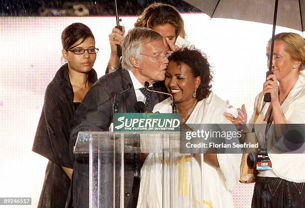 Actor Karl Heinz Boehm, his wife Almaz and daughter Aida attend the Save The World Awards at the nuclear power station Zwentendorf on July 24, 2009...