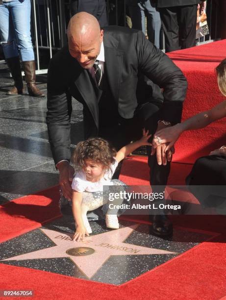 Actor Dwayne Johnson and Jasmine Johnson at the Dwayne Johnson Star Ceremony On The Hollywood Walk Of Fame held on December 13, 2017 in Hollywood,...