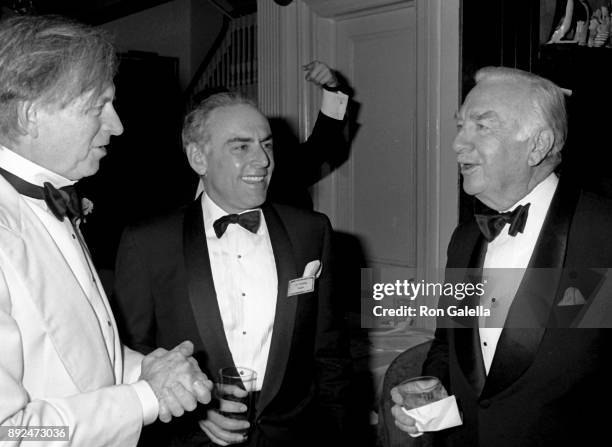 Tom Wolfe, Lee Eisenberg and Walter Kronkite attend Esquire Magazine Gala on November 13, 1989 at 21 Club in New York City.