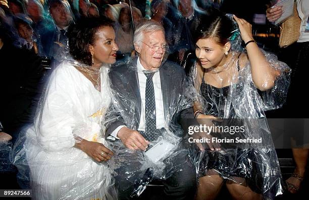 Actor Karl Heinz Boehm, his wife Almaz and daughter Aida attend the 'Save The World Awards' at the nuclear power station Zwentendorf on July 24, 2009...