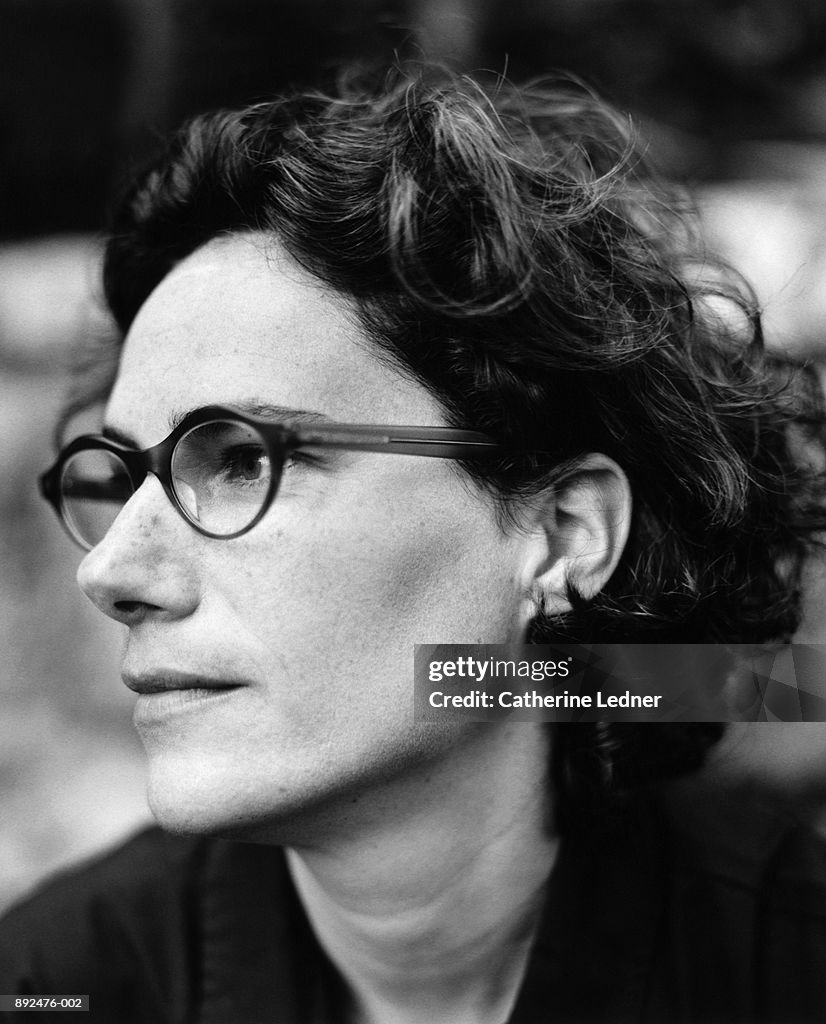 Woman wearing glasses, profile (B&W)