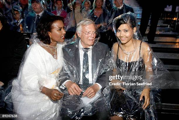 Actor Karl Heinz Boehm and wife Almaz and daughter Aida attend the Save The World Awards at the nuclear power station Zwentendorf on July 24, 2009 in...