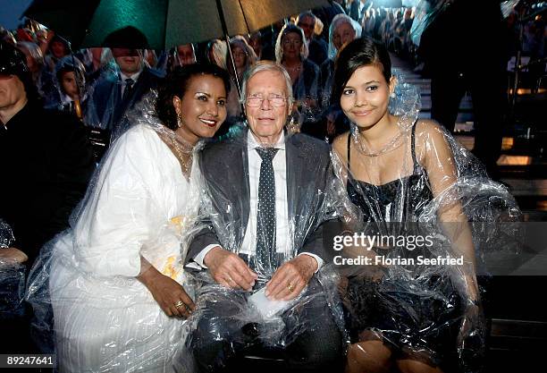Actor Karl Heinz Boehm, wife Almaz and daughter Aida attend the Save The World Awards at the nuclear power station Zwentendorf on July 24, 2009 in...