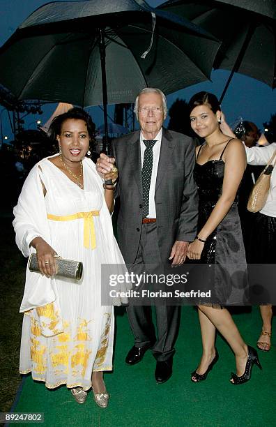 Actor Karl Heinz Boehm and wife Almaz and daughter Aida attend the Save The World Awards at the nuclear power station Zwentendorf on July 24, 2009 in...