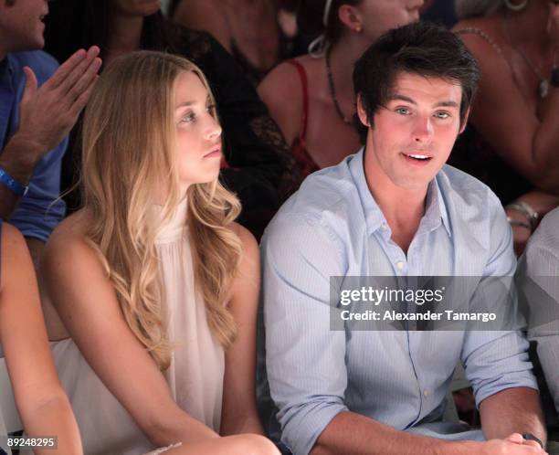 Whitney Port and Adam Gregory are seen sitting front row at the L Space fashion show during Mercedes Benz Fashion Week Swim at The Raleigh on July...