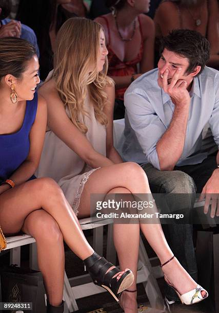 Whitney Port and Adam Gregory are seen sitting front row at the L Space fashion show during Mercedes Benz Fashion Week Swim at The Raleigh on July...