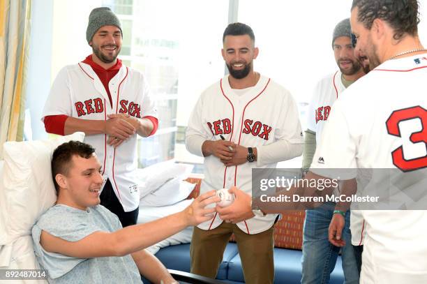 Boston Red Sox Robby Scott, Devin Marrero, Brian Johnson, and Heath Hembree visit Tyler at Boston Children's Hospital December 14, 2017 in Boston,...