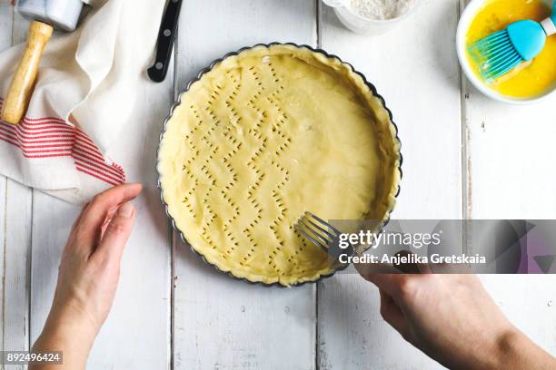 making a pie crust, top view - pie stock-fotos und bilder