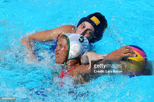 Keet Marcelle of South Africa challenges Marina Zablith of Brazil in the Women's Water Polo Semifinals between Brazil and South Africa during the...