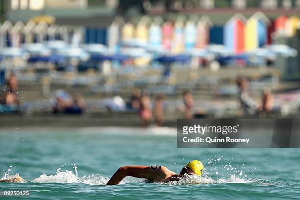 Trent Grimsey of Australia swims in the Men's 25 Km Open Water Swimming during the 13th FINA World Championships at Ostia Beach on July 25, 2009 in...