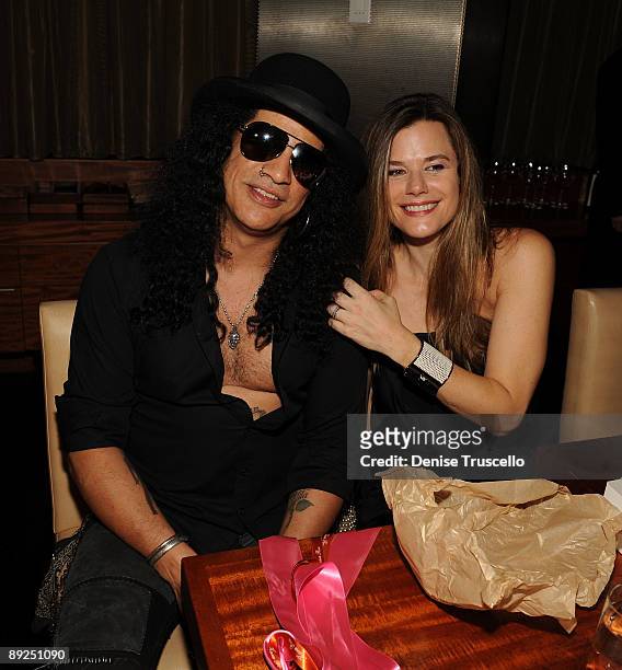 Slash and Gilligan Stillwater attend Slash's birthday dinner at Stack Restaurant at The Mirage Hotel and Casino on July 24, 2009 in Las Vegas, Nevada.