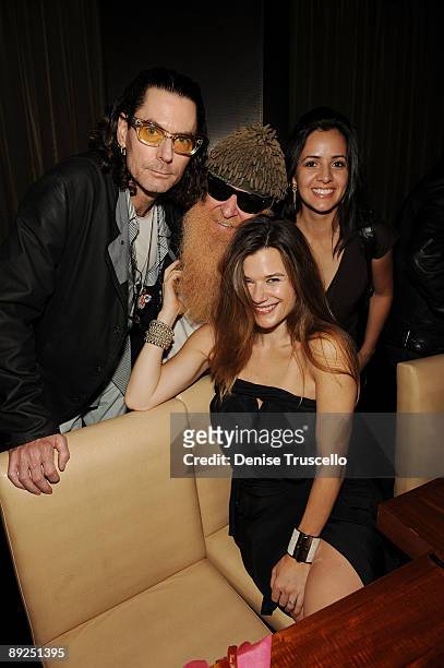 David Saltz, Billy Gibbons and Gilligan Stillwater attend Slash's birthday dinner at Stack Restaurant at The Mirage Hotel and Casino on July 24, 2009...