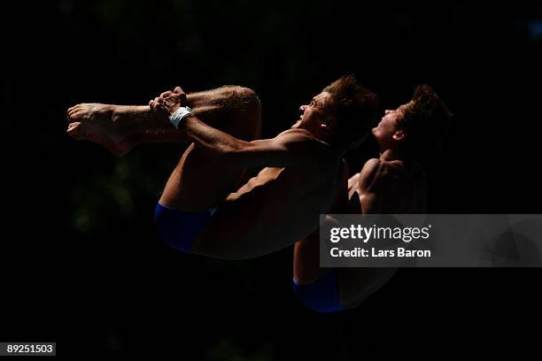 Oleksandr Bondar and Oleksandr Gorshkovozov of Ukraine compete in the Men's 10m Synchro Platform Final during the 13th FINA World Championships at...