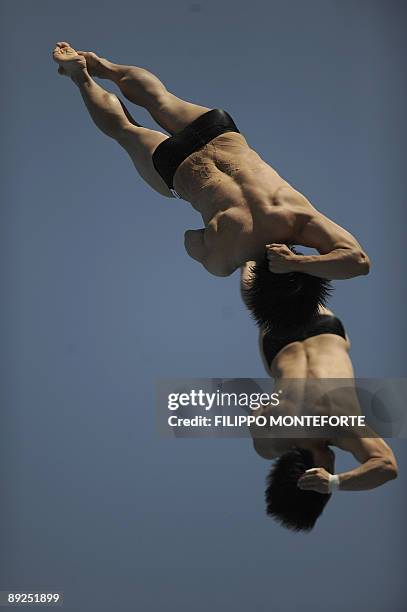 Korean divers Kwon Kyungmin and Cho Kwanhoon compete during the diving Men's 10m synchro final on July 25, 2009 at the FINA World Championships in...