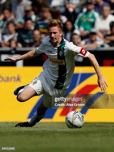 Marco Reus of M'Gladbach runs with the ball during a pre season friendly match between Borussia M'Gladbach and Bolton Wanderers at the Borussiapark...