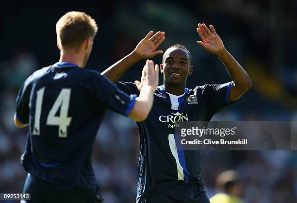 Paul Gallagher of Blackburn Rovers celebrates scoring the equalizer from the penalty spot with team mate Benni McCarthy during the Pre Season...
