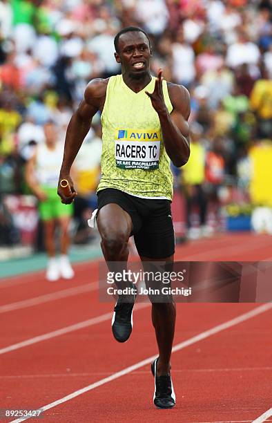 Usain Bolt of Jamaica crosses the line in the Men's 4x100 Metres Relay during day two of the Aviva London Grand Prix track and field meeting at...