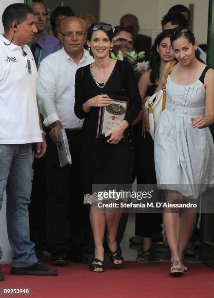 Actress Winona Ryder poses with the Giffoni Award during the 2009 Giffoni Experience on July 25, 2009 in Salerno, Italy.