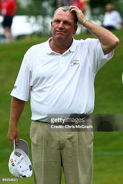 Mark Calcavecchia takes his hat off at the end of his round during round two of the RBC Canadian Open at Glen Abbey Golf Club on July 25, 2009 in...