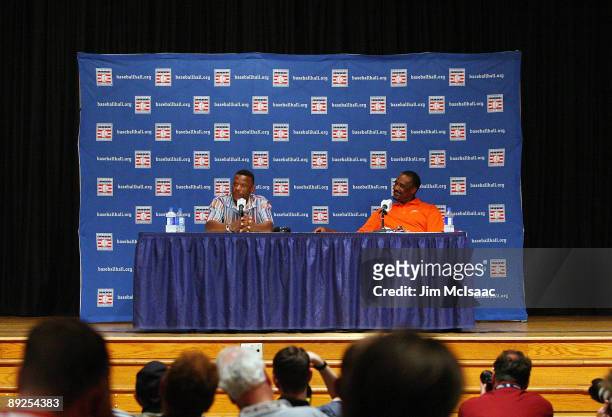 Inductees Rickey Henderson and Jim Rice speak to the media at the Cooperstown Central School during the Baseball Hall of Fame weekend on July 25,...