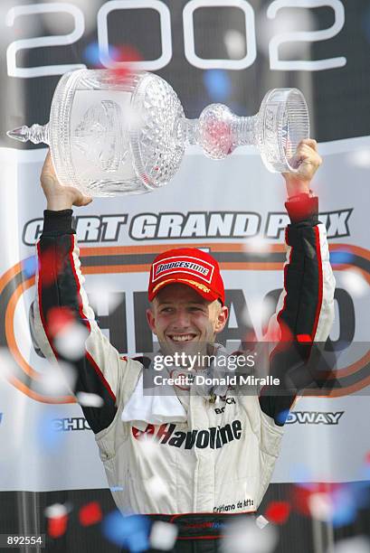 Cristiano da Matta celebrates winning the Grand Prix of Chicago round 7 of the CART FedEx Championship Series on June 30th 2002 at the Chicago Motor...