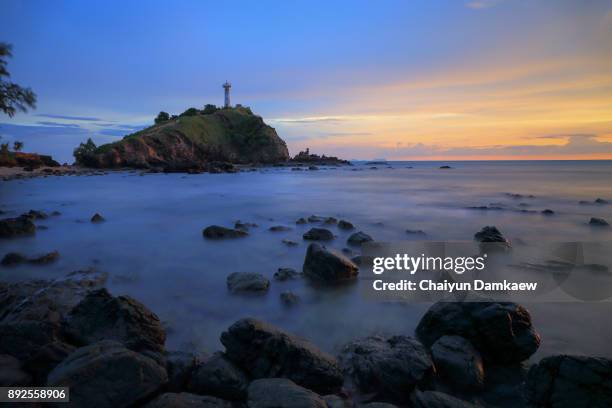 lighthouse in twilight at ko lanta island, krabi - steinschlag stock-fotos und bilder