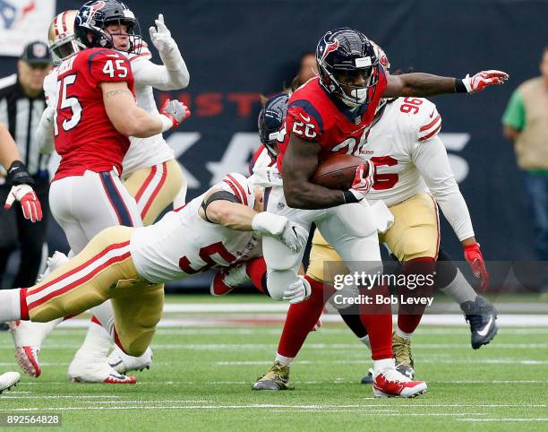 Lamar Miller of the Houston Texans rushes past the San Francisco 49ers at NRG Stadium on December 10, 2017 in Houston, Texas.