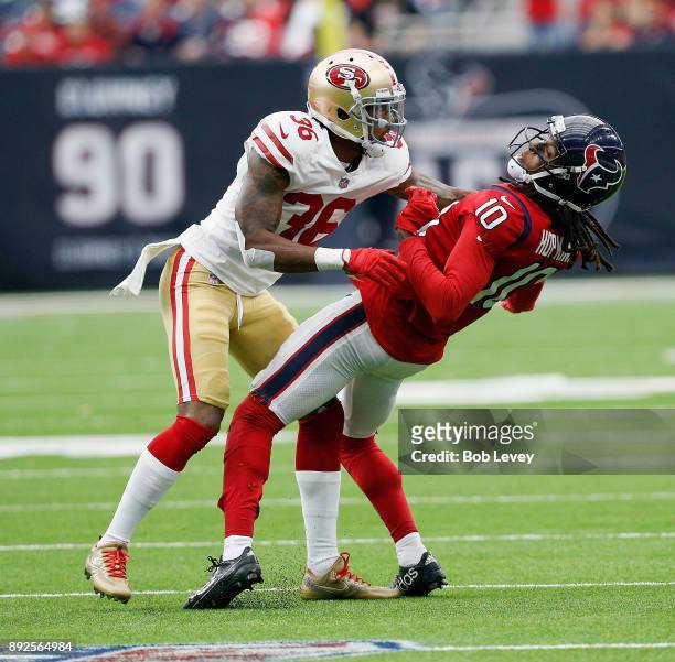 Dontae Johnson of the San Francisco 49ers interferes with DeAndre Hopkins of the Houston Texans at NRG Stadium on December 10, 2017 in Houston, Texas.