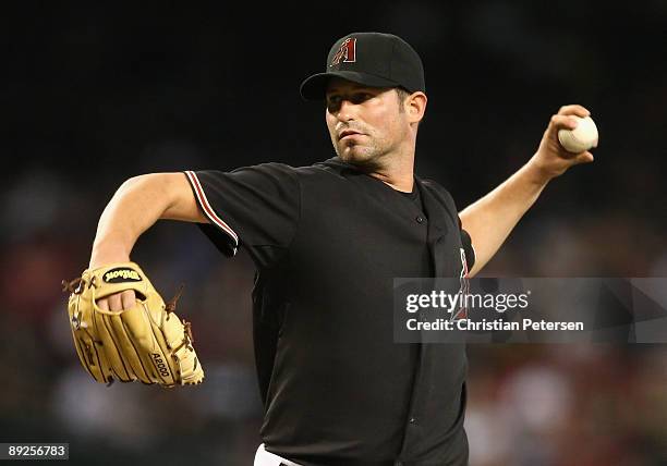 Starting pitcher Doug Davis of the Arizona Diamondbacks pitches against the Pittsburgh Pirates during the major league baseball game at Chase Field...