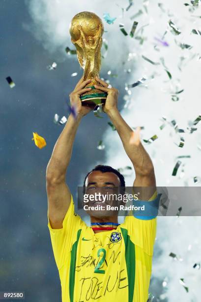 Cafu of Brazil lifts the trophy after the Germany v Brazil, World Cup Final match played at the International Stadium Yokohama in Yokohama, Japan on...