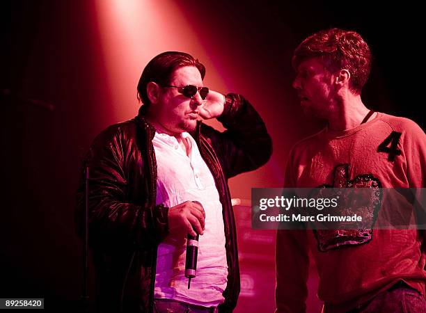 Shaun Ryder and Bez from The Happy Mondays perform on stage during the Splendour in the Grass festival at Belongil Fields on July 24, 2009 in Byron...