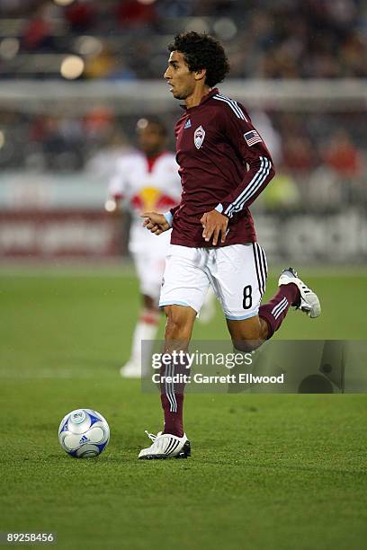 Mehdi Ballouchy of the Colorado Rapids controls the ball against the New York Red Bulls on July 25, 2009 at Dicks Sporting Goods Park in Commerce...