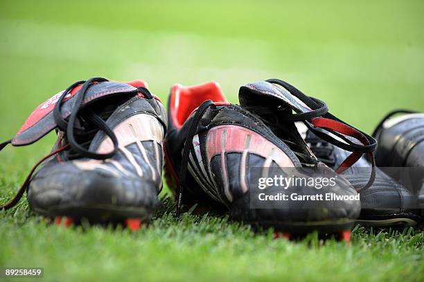 Shoes of the Colorado Rapids sit on the grass prior to the game against the New York Red Bulls on July 25, 2009 at Dicks Sporting Goods Park in...