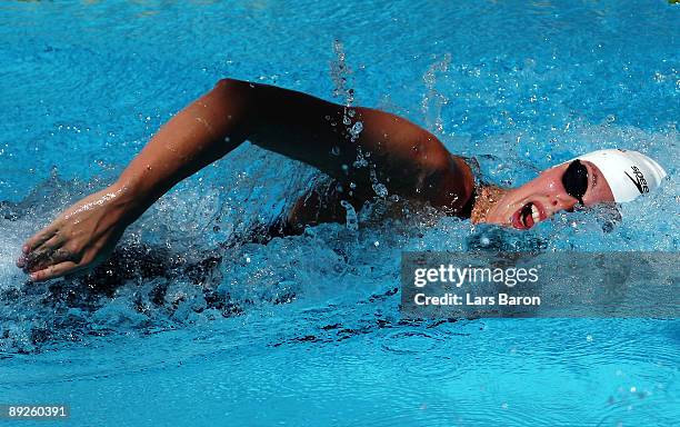 Allison Schmitt of the United States competes in the Women's 400m Freestyle Heats during the 13th FINA World Championships at the Stadio del Nuoto on...